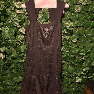 Black sequin cocktail dress
BCBG size 6